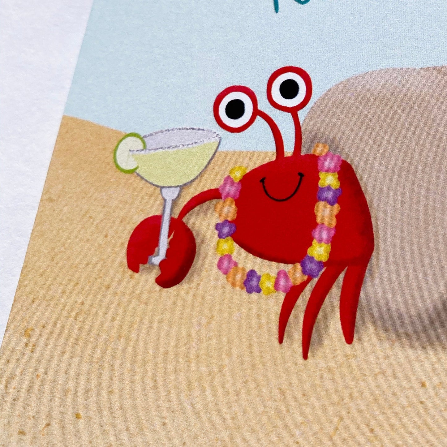 Tropical Retirement Card with a crab holding a margarita that says "it's time to site back, relax and shellebrate your retirement!