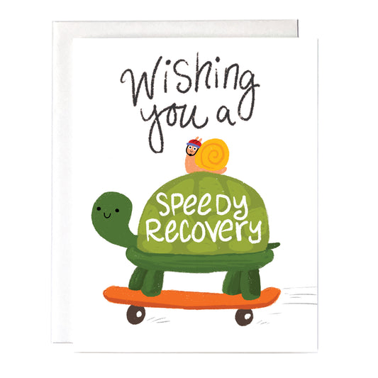 A get well greeting card with a cute turtle on a skateboard. It reads "wishing you a speedy recovery". There is also a snail on the turtle.