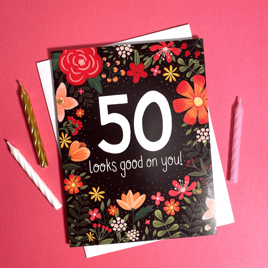 50 looks good on you 50th birthday card with flowers
