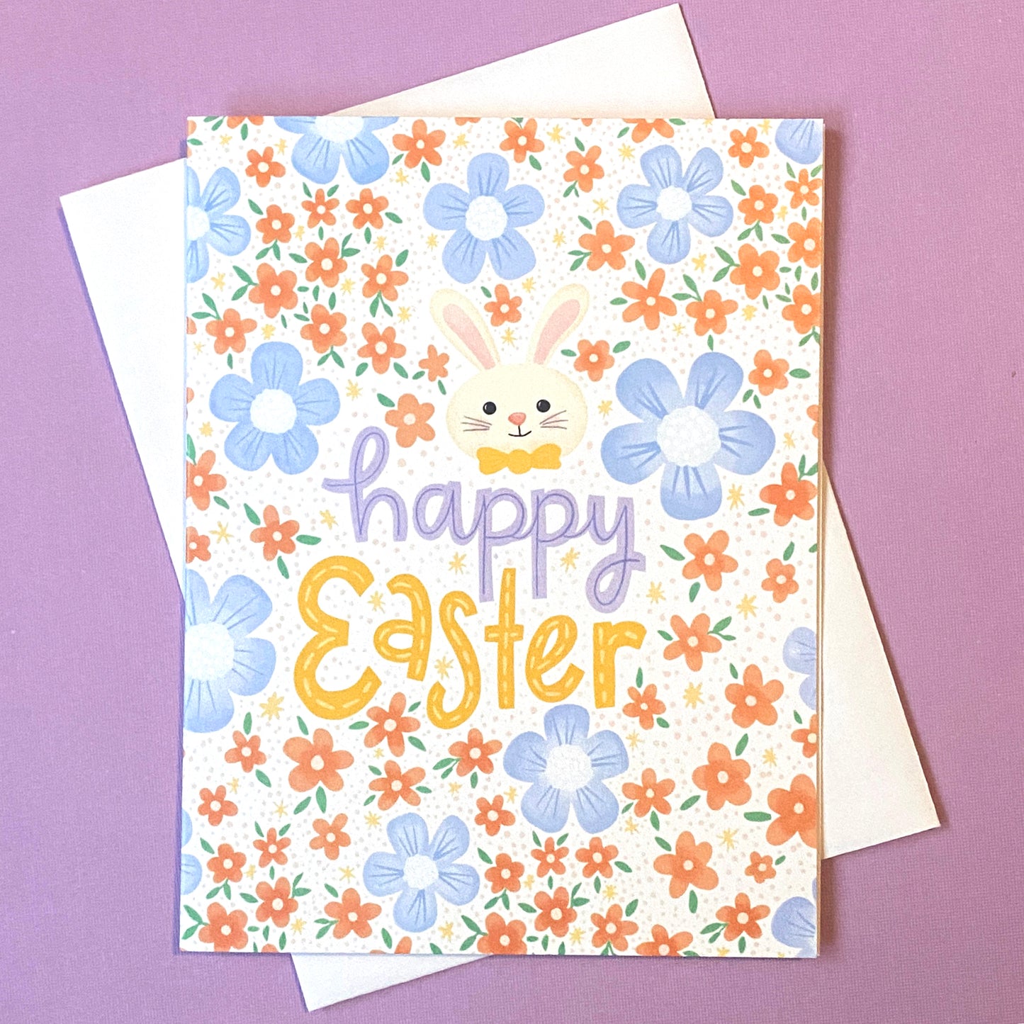 happy easter card with lots of flowers and a cute bunny.