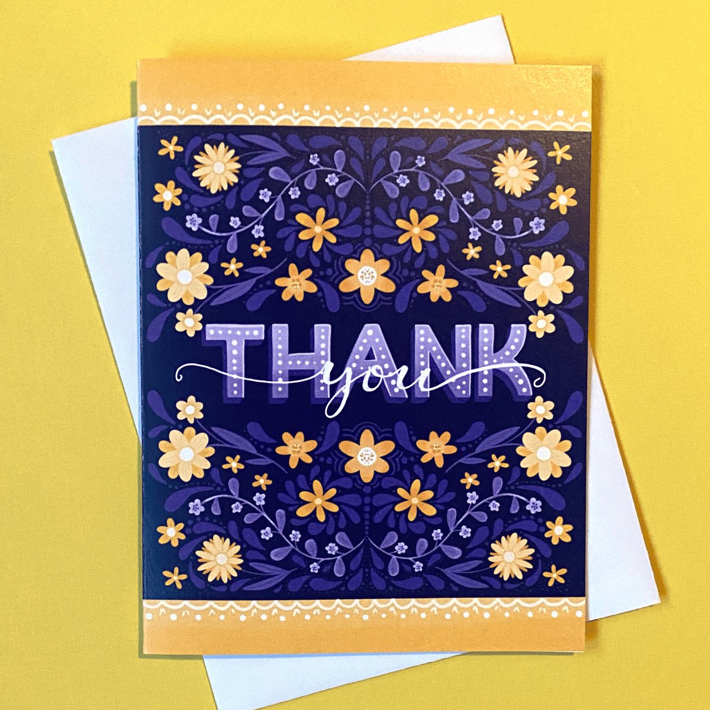 Greeting card with purple and yellow flowers that reads Thank You
