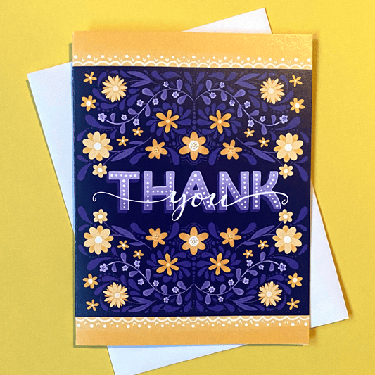 Greeting card with purple and yellow flowers that reads Thank You