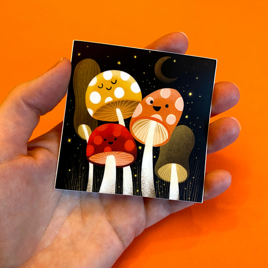 Vinyl sticker featuring an adorable group of happy mushrooms! Original art by Anna Fox  Sticker printed with a matte finish on premium vinyl with a strong adhesive.  Waterproof, Dishwasher safe and scratchproof sticker that is made to last!  3 inches x 3 inches square sticker.  Wrapped in a protective plastic sleeve that is made of plant- based polylactic acid (PLA) and is certified compostable