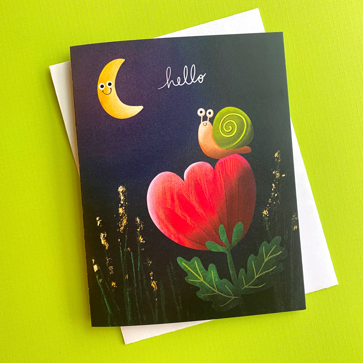 An adorable greeting card with a happy snail who is smiling at the moon while sitting on a flower. Perfect way to say hello!