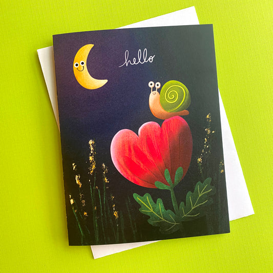 An adorable greeting card with a happy snail who is smiling at the moon while sitting on a flower. Perfect way to say hello!
